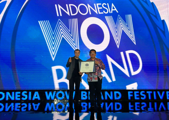 JNE Sabet Penghargaan Gold Champion Indonesia WOW Brand 2023 